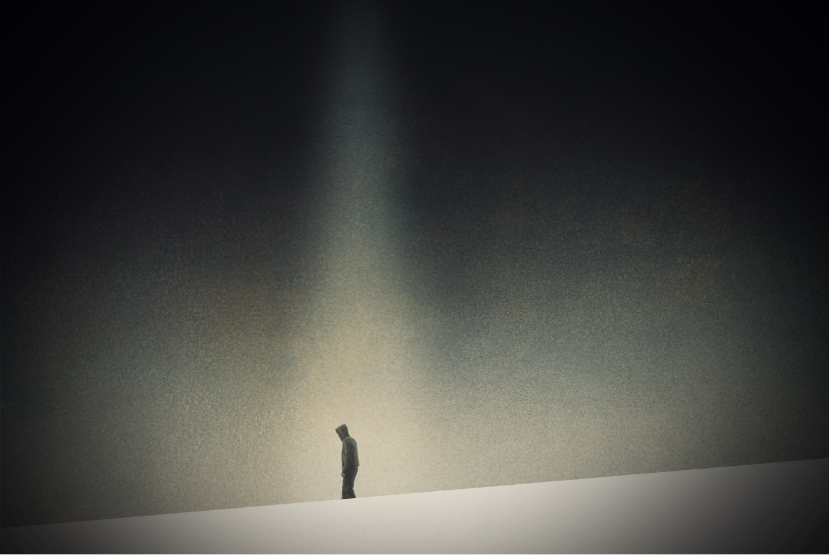man standing in a void with the spotlight on him