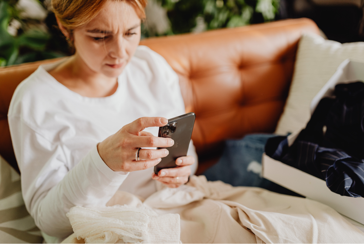 woman scrolling on her phone